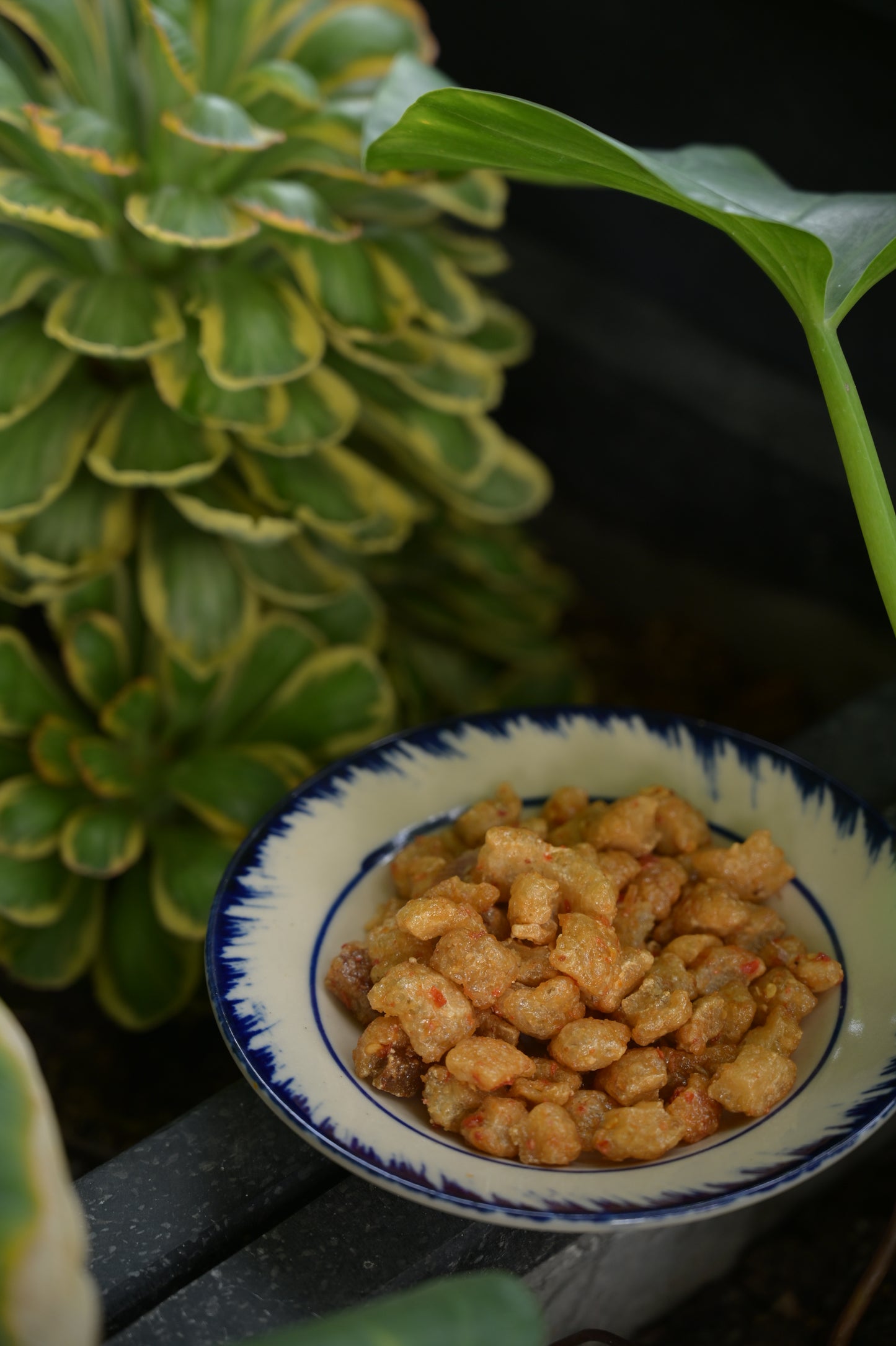 Crunchy Pork Cracklings tossed in fiery fish sauce